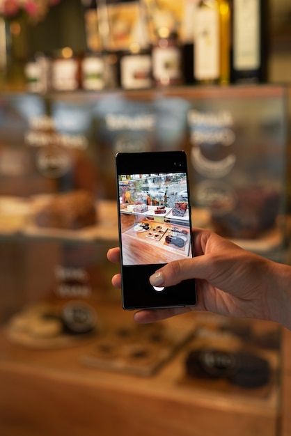 Close up hand holding smartphone