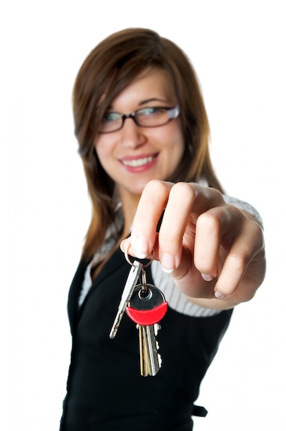 Free photo close-up of hand holding some keys