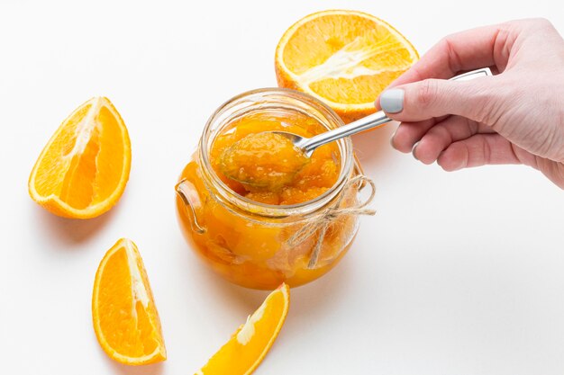 Close-up hand holding spoon