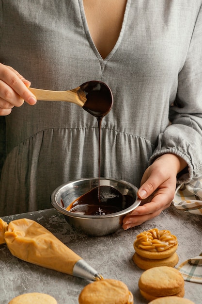 Close up hand holding spoon