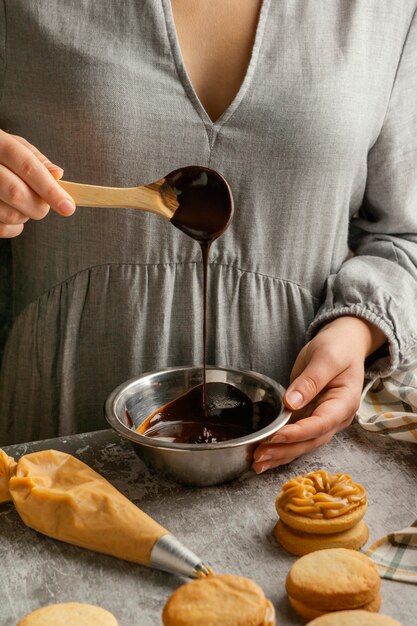 Close up hand holding spoon