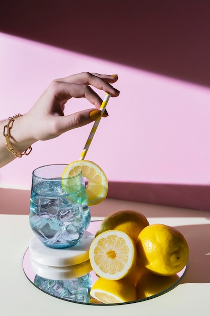 Close up hand holding straw