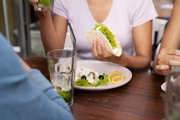 Close up hand holding taco