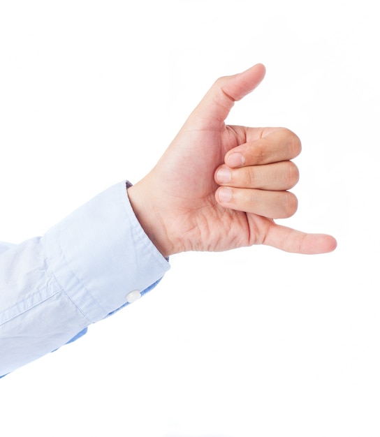 Close-up of hand making a call phone me gesture