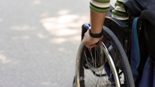 Close-up hand moving wheel