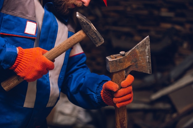 Close up of hand of repairman, professional builder working indoors, repairing