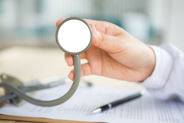 Free photo close-up of hand showing a stethoscope