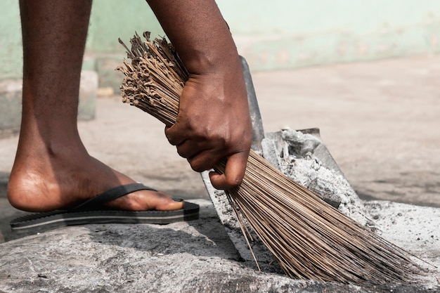 Close-up hand sweeping