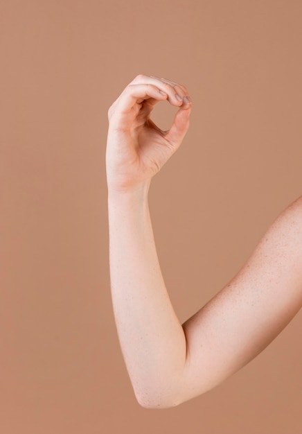 Close up of a hand teaching sign language