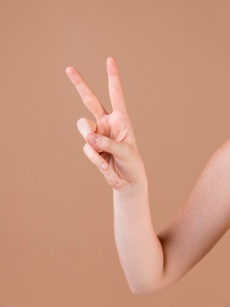 Close up of a hand teaching sign language