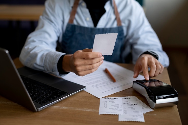 Free Photo close up hand typing on pos