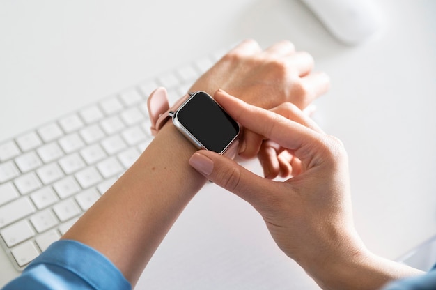 Close up hand wearing smartwatch