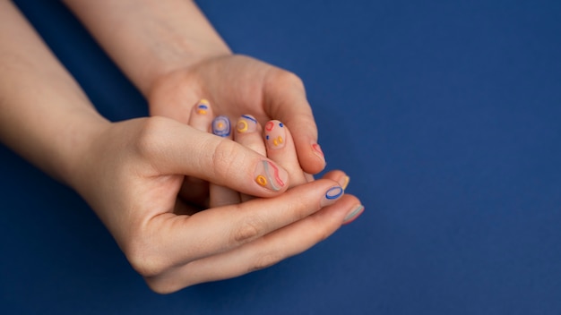 Close up hands and blue background