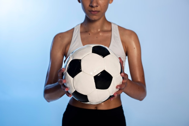 Free photo close up hands holding ball