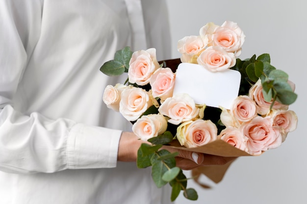 Close up hands holding beautiful bouquet