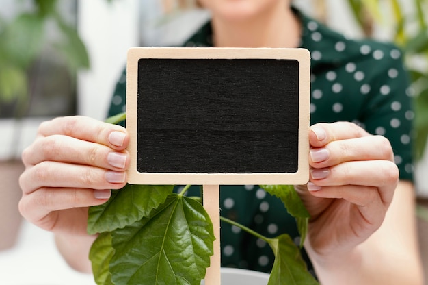 Free photo close-up hands holding board