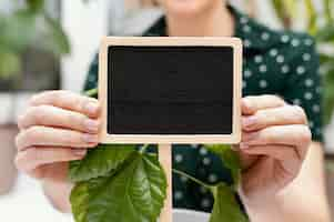 Free photo close-up hands holding board