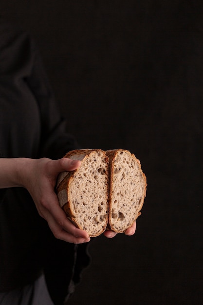 Close-up hands holding bread