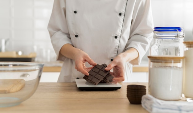 Free photo close up hands holding chocolate