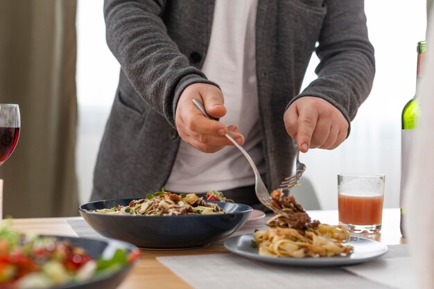 Close up hands holding cutlery