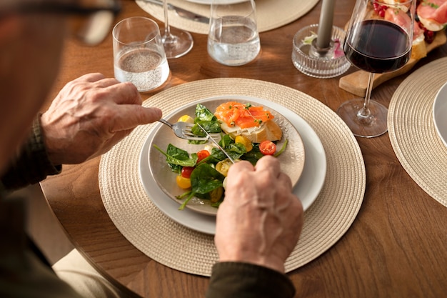 Close up hands holding cutlery