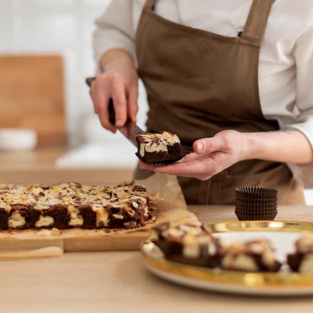 Close up hands holding dessert