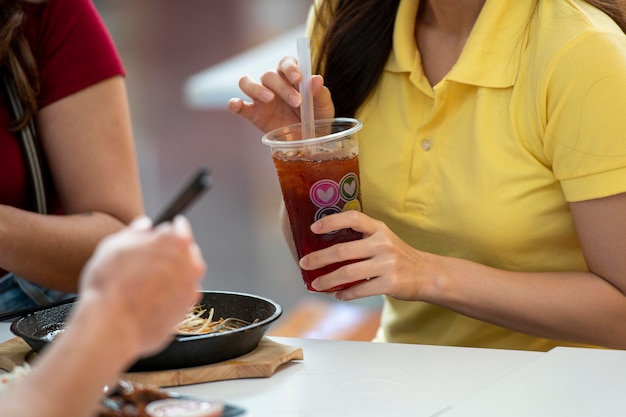 Close up hands holding drink