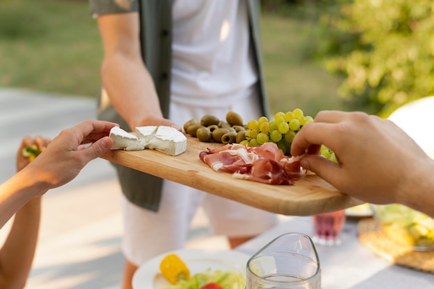 Free photo close up hands holding food