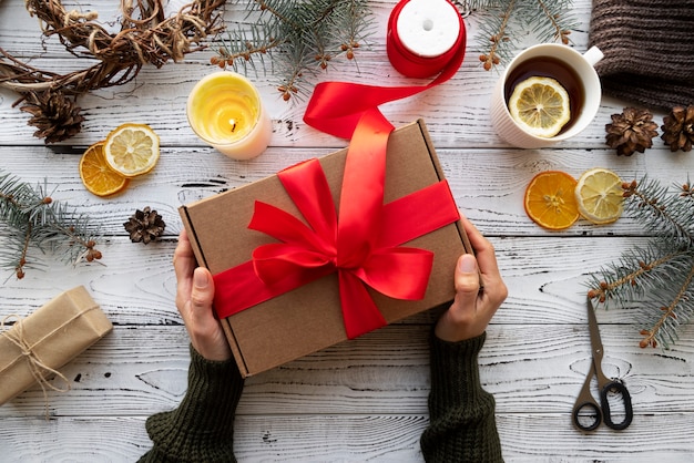 Close up hands holding gift