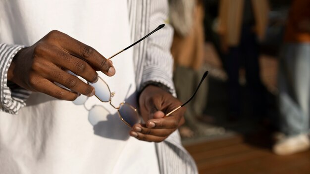 Close up hands holding glasses