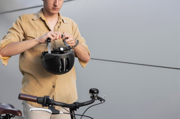 Close-up hands holding helmet