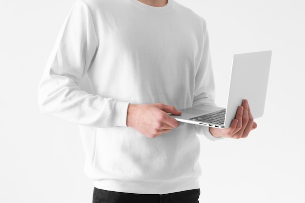 Free photo close up hands holding open laptop