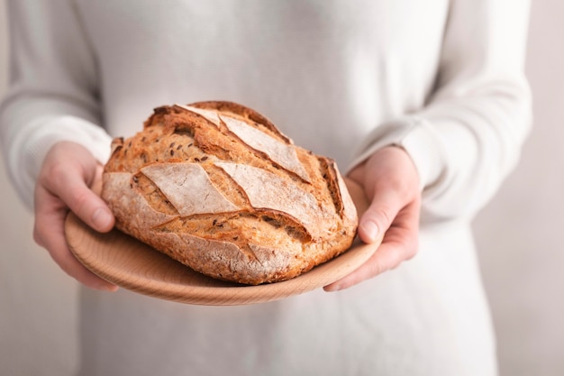 Close-up hands holding plate