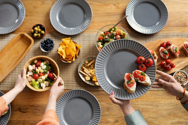 Close up hands holding plate