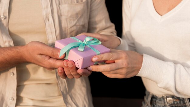 Close-up hands holding present