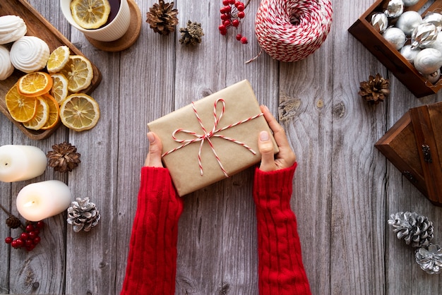 Free photo close up hands holding present