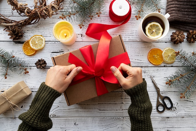 Close up hands holding ribbon