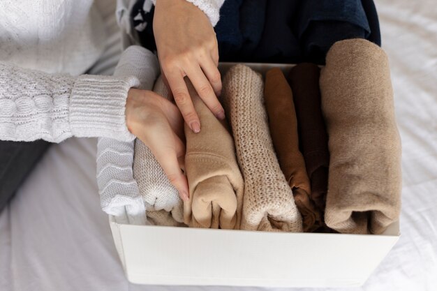 Close up hands holding shirt