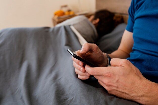 Close-up hands holding smartphone