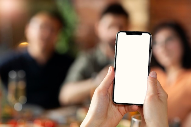 Close up hands holding smartphone