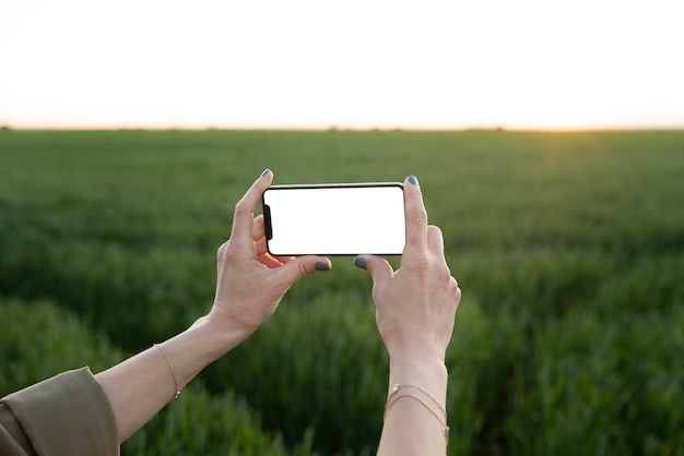 Close up hands holding smartphone