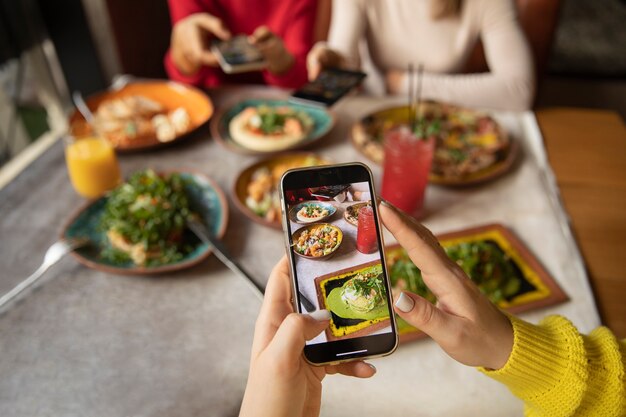 Close up hands holding smartphone