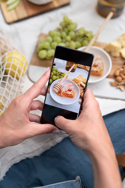 Close up hands holding smartphone