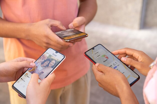 Close up hands holding smartphones