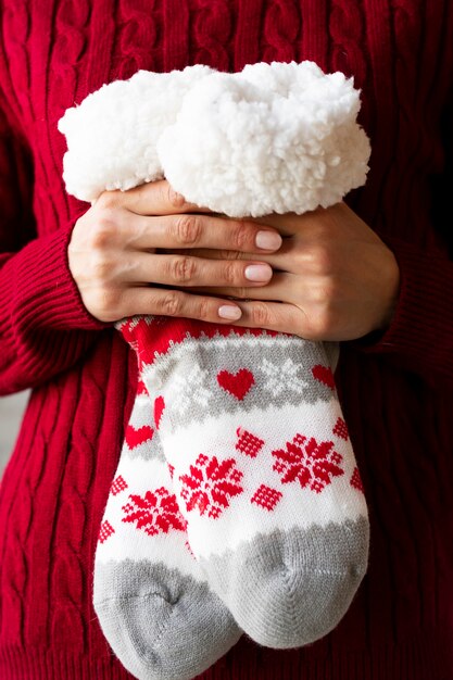 Close up hands holding socks