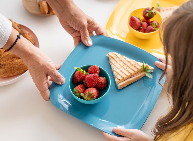 Close up hands  holding tray