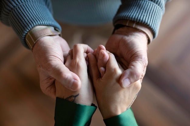 Close up on hands holding