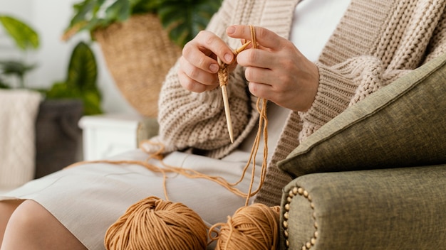 Close-up hands knitting with needles