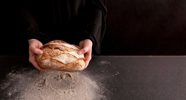 Close-up hands making dough