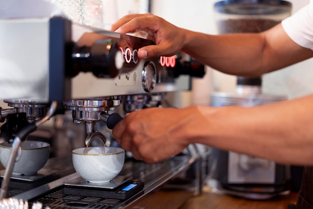 Close up hands preparing coffee